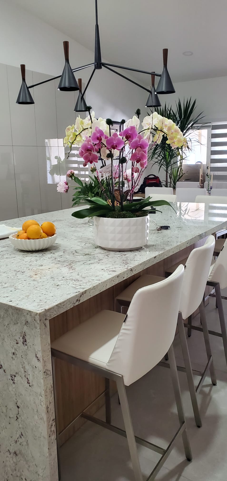 Cream and pink phalaenopsis in a diamond pot, kitchen island